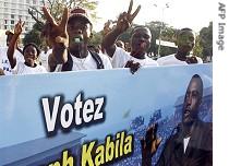 Supporters of President Joseph Kabila chant slogans in Kinshasa, 26 October 2006